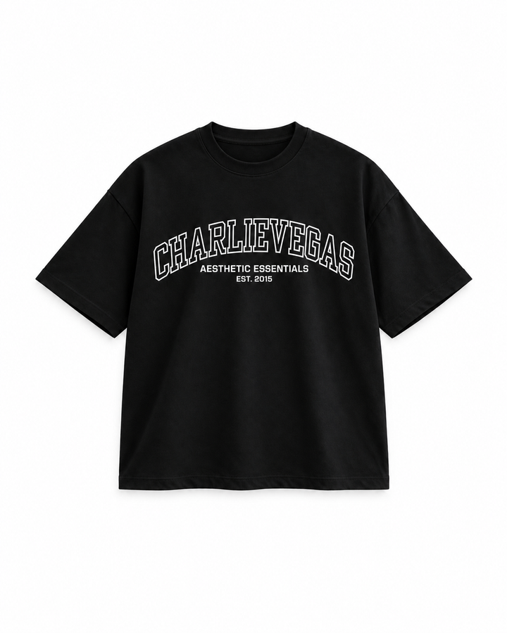 Varsity Tee in black, flat lay showing the CHARLIEVEGAS varsity print