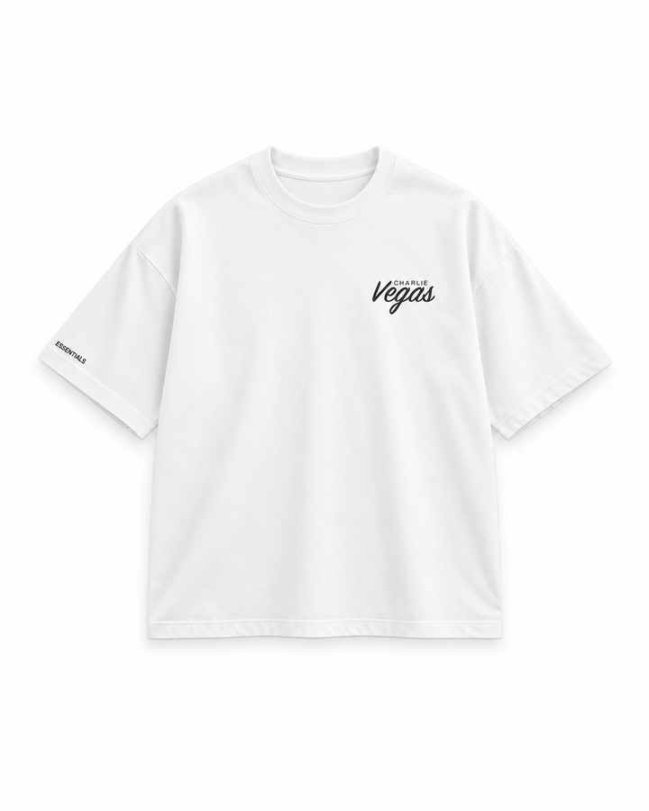 Signature Tee in white, flat lay with Vegas chest logo